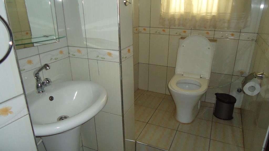 Wadoma Royale Hotel Кумаси Номер фото