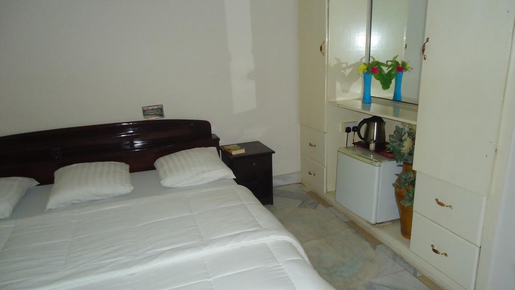 Wadoma Royale Hotel Кумаси Номер фото